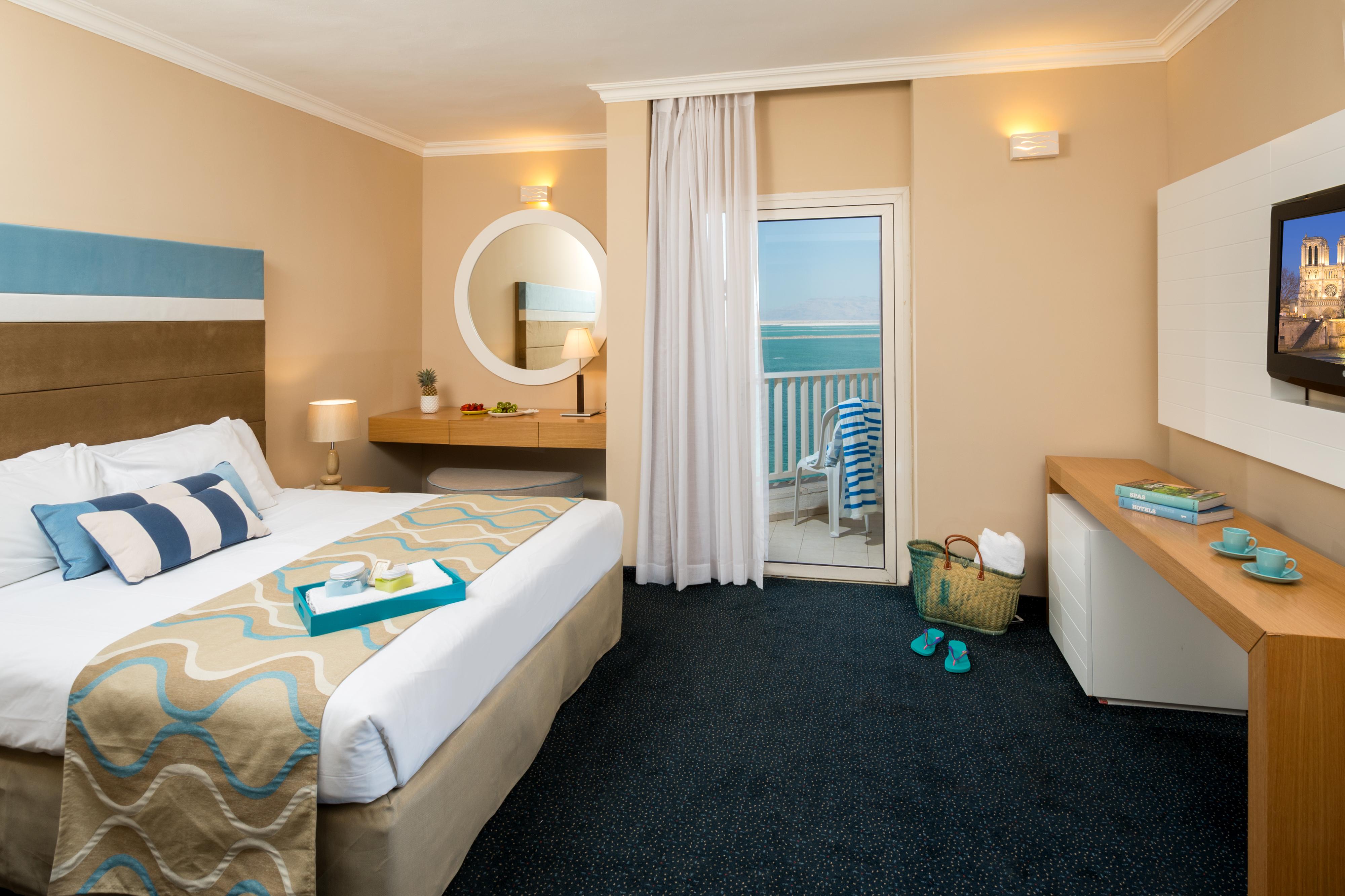 โรงแรมลีโอนาร์โด คลับ เดด ซี ออล อินคลูซีฟ เนเว โซฮาร์ ภายนอก รูปภาพ A room at the hotel